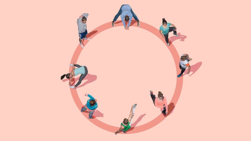 group of people working out exercising stretching in a circle from above